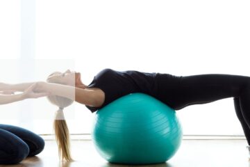 Chartered physiotherapist guiding a client through rehabilitation exercise at PREP Physio, Ballsbridge