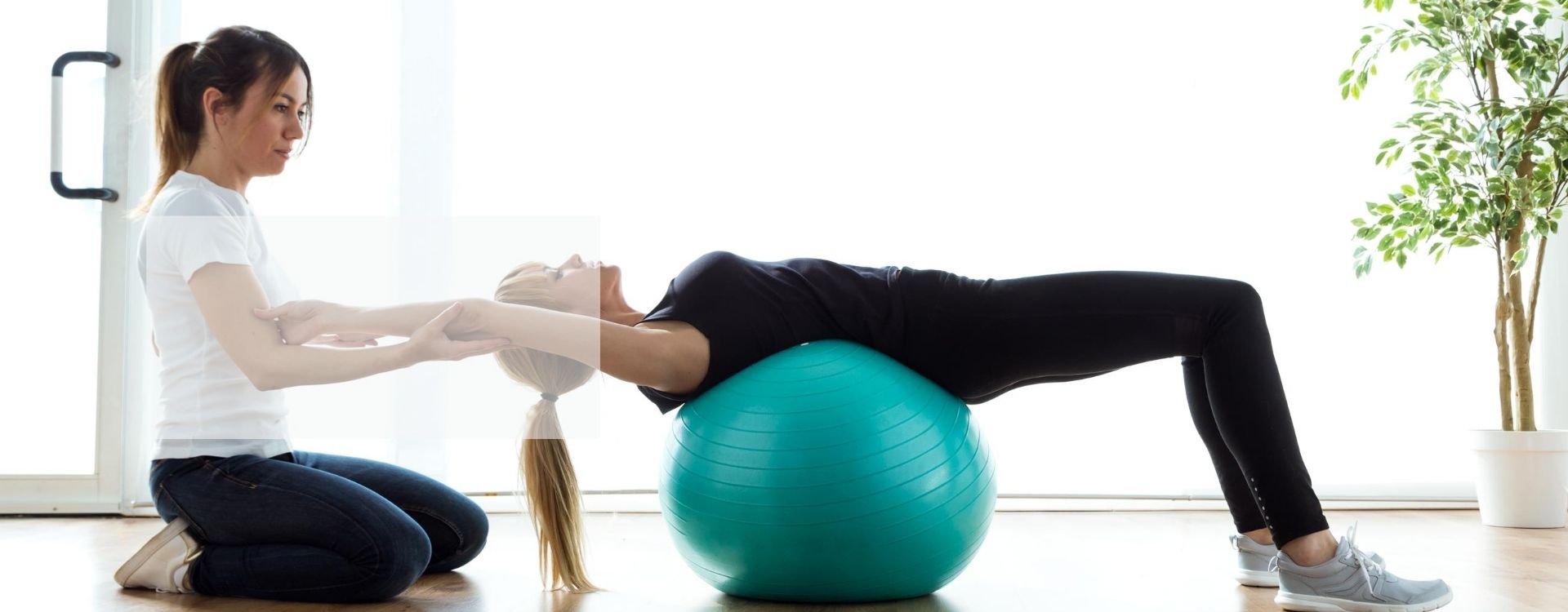 Chartered physiotherapist guiding an athlete through sports injury rehabilitation at PREP Physio
